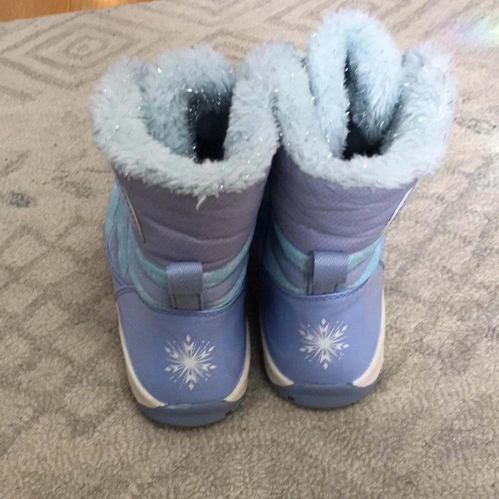 Blue Disney/Sorel snow boots with snowflakes